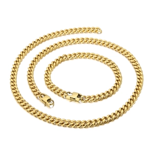 Polished gold Cuban link chain set including a matching necklace and bracelet for men