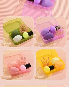 Makeup sponge set with beauty blenders, brushes and metal holders in colorful storage boxes