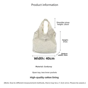 Détails du sac cabas en velours côtelé avec dimensions 40x31cm et motif à fleurs