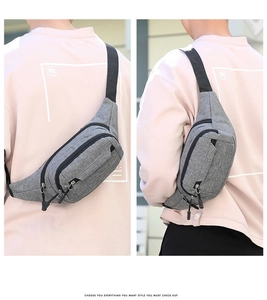 Close-up of durable heather grey oxford fabric texture and zippers on this casual waist bag