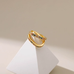 Elegant 18K gold-plated criss-cross ring featuring colorful cubic zirconia stones