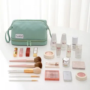 Mint green double-layer large capacity makeup bag with handle and travel logo
