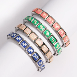 Detail of modular Italian bracelets featuring colorful enamel zodiac charms and steel links