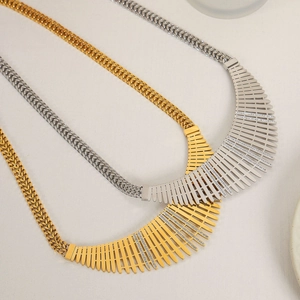 Statement wide metal necklace set with cubic zirconia in gold and silver fence style