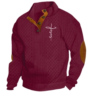 Detail of burgundy knitted pullover featuring buttoned collar and Jesus logo on chest