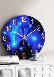 Detail of 3mm ultra-thin silent quartz wall clock with blue geometric texture and numeric scale
