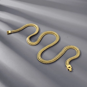 Detailed view of the woven texture and golden finish on a men's titanium fox tail chain