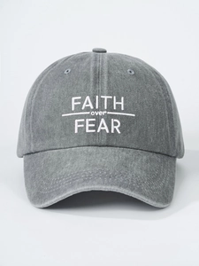 Detailed view of white Faith over Fear embroidery on washed dark gray cotton baseball cap