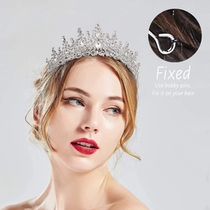 Elegant silver wedding tiara with sparkling rhinestones shown on a model