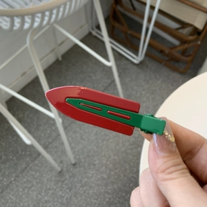 Vintage metal hair clip in Ancora red and green colors with a glossy finish