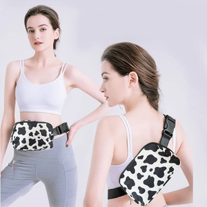 Waterproof cow print fanny pack for sports, shown as a waist bag and crossbody chest bag