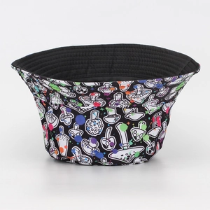 Detail of mushroom pattern and colorful paint splashes on casual outdoor bucket hat