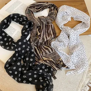 Elegant polka dot and animal print fabric scarf necklace with a lightweight chiffon texture