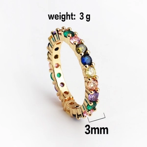Detail view of 3mm wide gold plated ring with colorful cubic zirconia pavé stones
