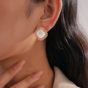 Elegant square stud earring featuring a white opal center stone with double diamond halo