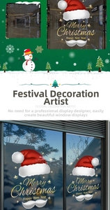 Detail of red Santa hat and Merry Christmas decals on a glass shop window display