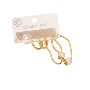 Three pairs of golden stainless steel rhinestone heart and geometric hoop earrings on card