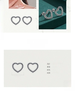 Detailed view of hollow heart stud earrings in S925 sterling silver with dimensions