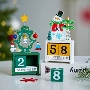 Christmas wooden perpetual calendar with snowman and tree shapes for holiday desk decor