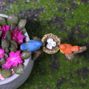 Miniature bird nest with colorful resin birds and spotted eggs for garden micro landscape