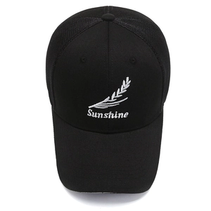 Black mesh trucker hat with Sunshine wheat embroidery and breathable back panels