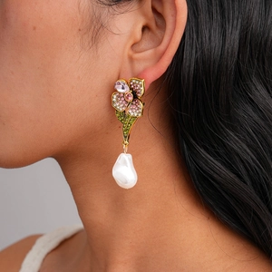 Luxury flower earrings with colorful crystals and white baroque pearls on female model