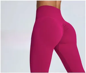 Close-up of rose red yoga pants featuring high waist and scrunch butt lifting detail