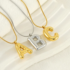 Puffy balloon letter A B C necklaces in gold and silver finish on sleek snake chains