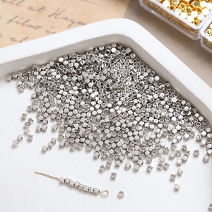 Detailed view of silver plated cube spacer beads for DIY jewelry and bracelet making