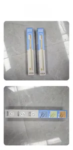 Detail of multi-functional pet toothbrush set for dogs and cats in retail packaging