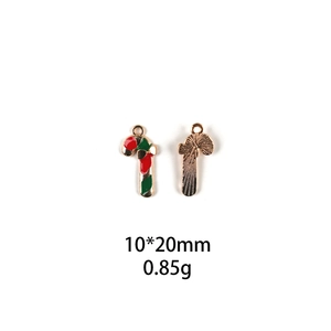 Detail of candy cane alloy pendant in red and green enamel with 10x20mm size mark