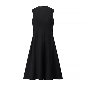 Detail shot of the back of a black sleeveless A-line dress with a subtle hidden zipper