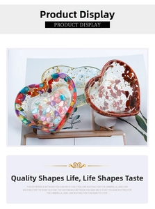 Three-piece set of heart-shaped resin bowls with colorful crystals and gold foil