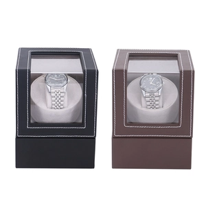 Dual automatic watch winders in black and brown leather with transparent display windows