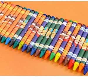 Close-up of multicolored Christmas crayons with reindeer patterns and Merry Christmas text