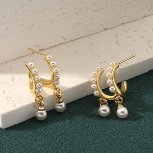 Elegant gold C-shaped double-layer earrings with white small pearls and drop pendants
