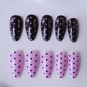 Pink and purple polka dot almond press-on nails with a glossy mirror finish, 10-piece set