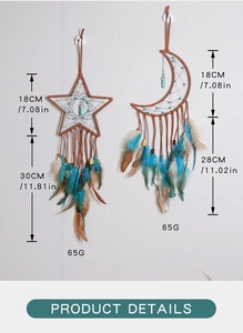 Detail view of moon and star dreamcatcher wall decor with feathers and size dimensions