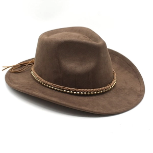 Detail of dark brown faux suede cowboy hat with braided leather band and gold metal beads