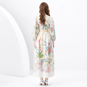 Floral V-neck pleated maxi dress with lantern sleeves and waist belt back view