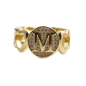 Golden heart band open ring featuring letter M medallion and sparkling zirconia accents