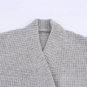 Gray V-neck double-breasted knit cardigan sweater with textured waffle knit pattern