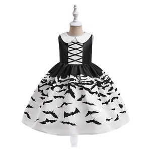 Detail of girls' Halloween dress featuring bat prints, doll collar, and lace-up bodice