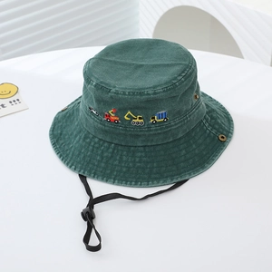 Close-up of kids bucket hat with embroidered construction vehicles and adjustable wind cord