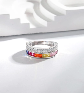 Macro detail of S925 sterling silver ring with princess cut rainbow gemstones and pavé zircon