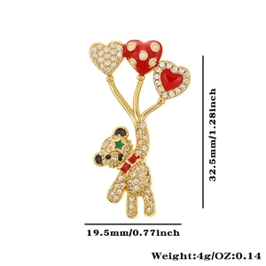 Detail view of bear and balloon pendant with size and weight measurements in inches and mm