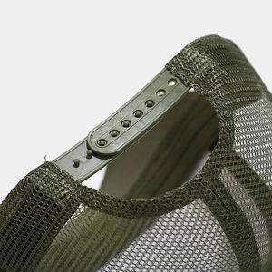 Detail of adjustable snapback closure and breathable mesh on army green trucker hat