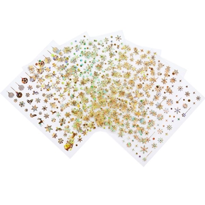 Laser gold Christmas snowflake nail art stickers set with festive decorative patterns