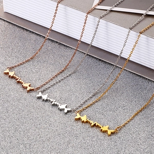 Minimalist stainless steel necklaces in gold, rose gold and silver with fishbone pendants