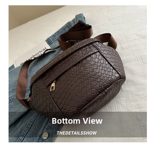 Detail of dark brown woven leather chest bag with golden zipper and nylon strap